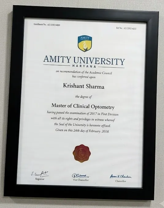 A framed degree certificate from Amity University Haryana conferring the degree of Master of Clinical Optometry on Krishant Sharma, dated 24 February 2018.